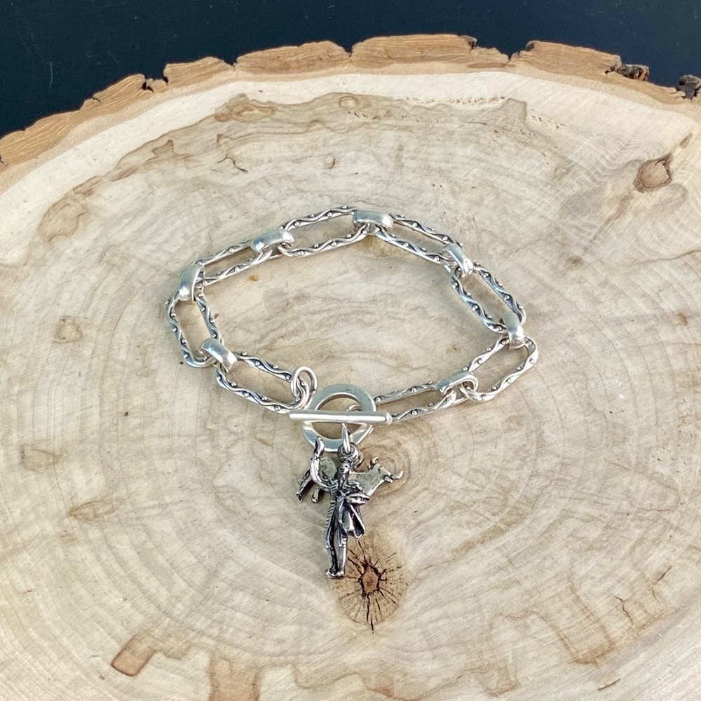 Antique Silver Bull and Matador bracelet